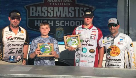 Landon Brock (second from left) and Hunter Napier (second from right) were winners in a recent fishing tournament at Watts Bar Lake.
