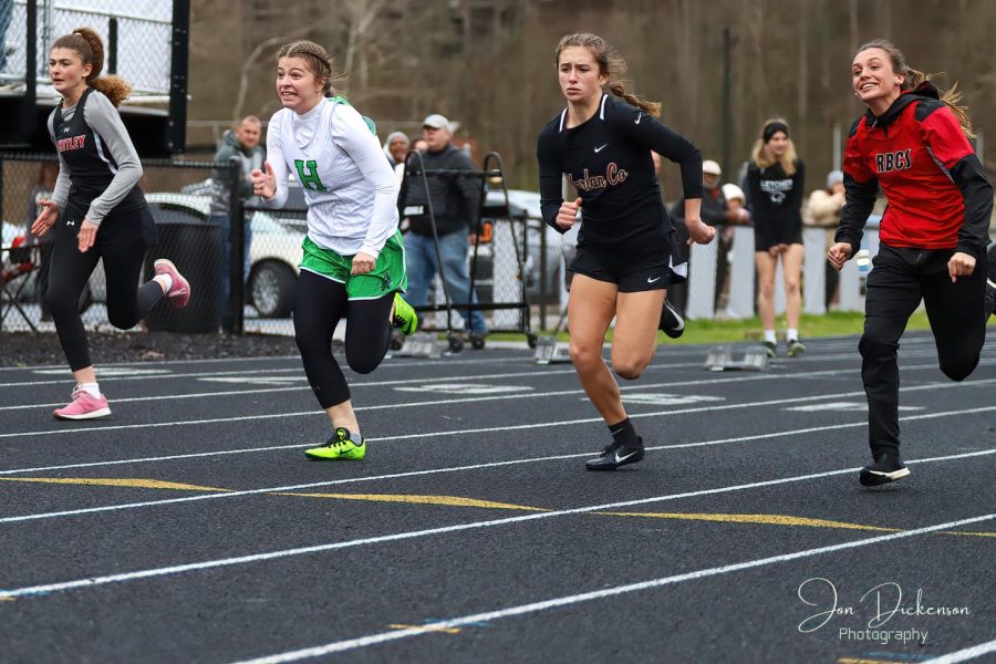 Harlan Countys Ella Karst and Harlans Emma Owens claimed the top two spots in the 100-meter dash Friday at the Coal Miners Memorial Invitational.
