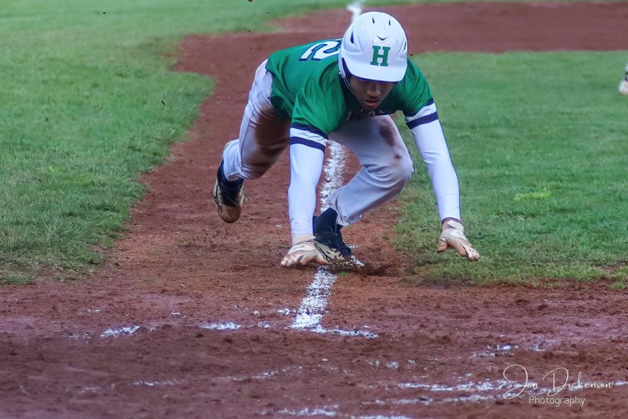 Harlans Jaeden Gist slid home during last weeks win over Bell County. The Dragons fell 7-3 on Tuesday at Middlesboro. The two district rivals will play again Wednesday at Harlan.