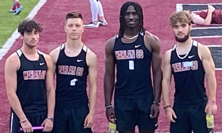 The relay team of Luke Carr, Luke Kelly, Demarco Hopkins and Thomas Jordan set school records in both the 4 x 100 and 4 x 200 events Friday.