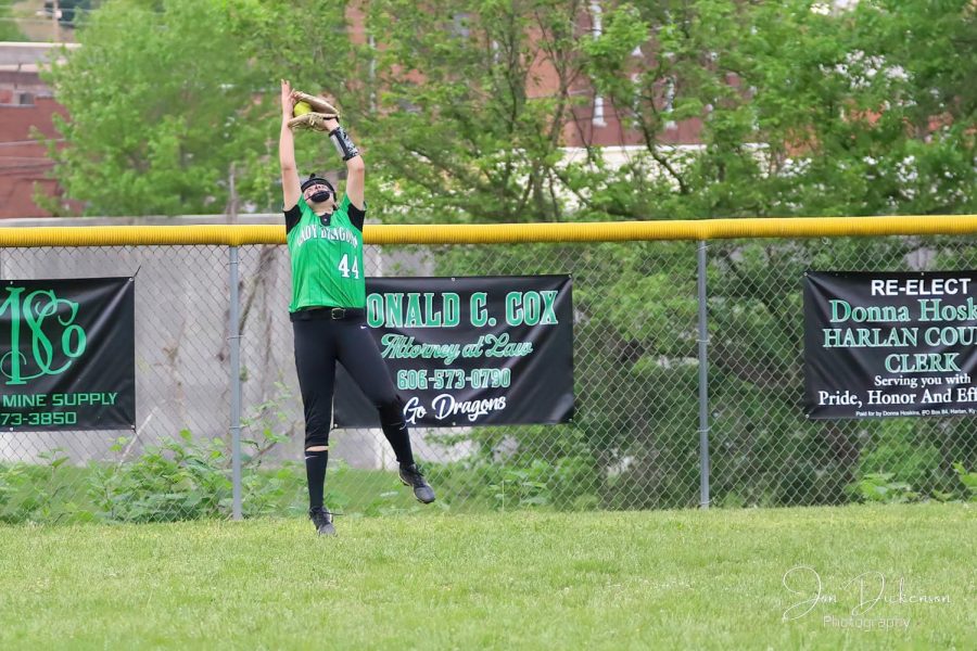 Harlan outfielder Annie Hoskins went back to make a catch in a game against Harlan County earlier this week. The Lady Dragons lost to Middlesboro on Tuesday.