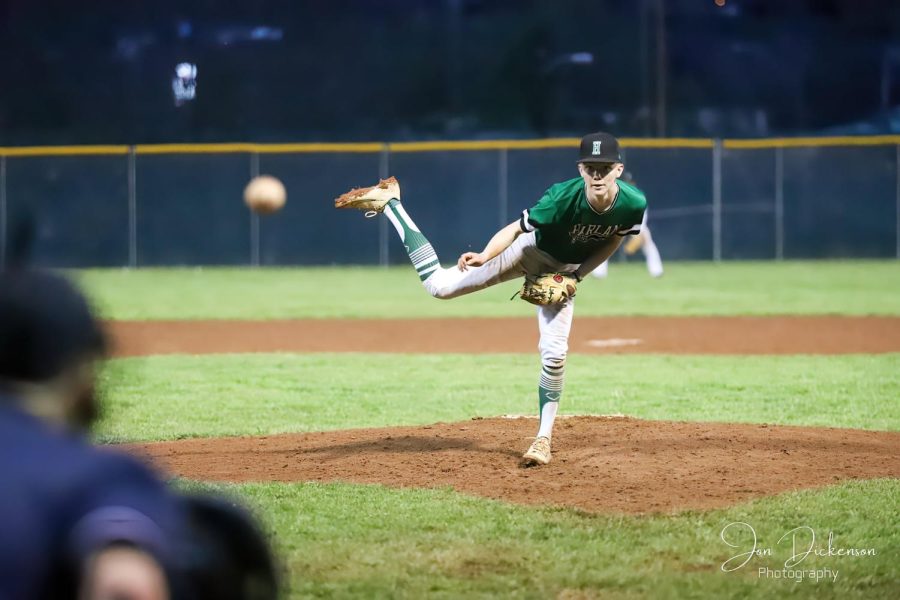 Harlans+Evan+Browning%2C+pictured+in+action+earlier+this+season%2C+was+the+winning+pitcher+Thursday+as+the+Green+Dragons+celebrated+Senior+NIght+with+a+16-1+win+over+Pineville.