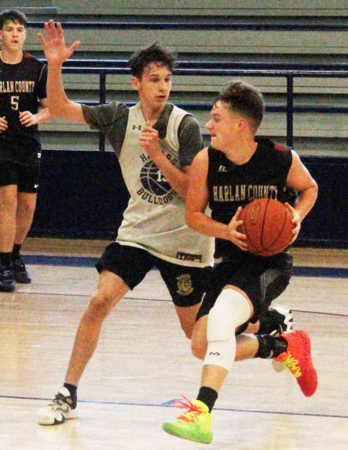 Harlan County sophomore guard Ethan Simpson worked against a Hazard defender in junior varsity action Monday. Simpson scored eight points in the Bears 45-38 win.