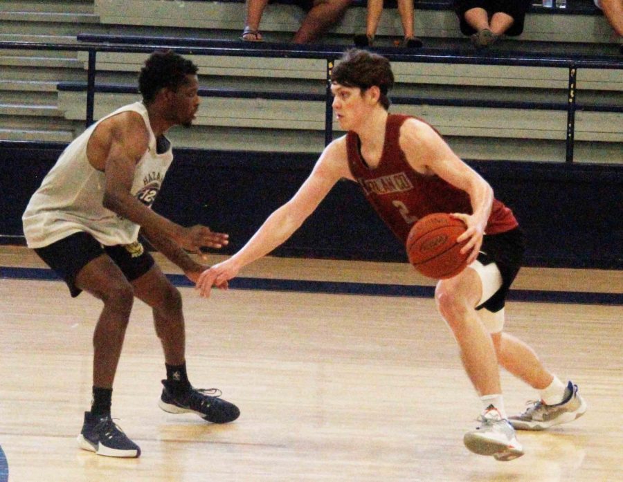 Harlan County Trent Noah worked against Hazards Jamal Hazell in scrimmage action Monday. Noah scored 15 points against Hazard and 29 against Martin County as the Bears won twice.