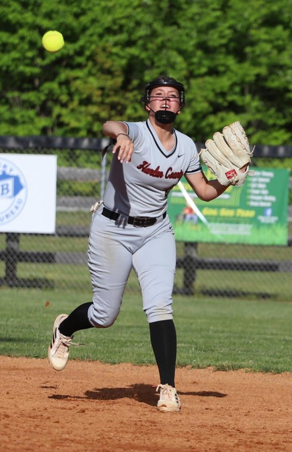Harlan County second baseman Jenna Wilson made a throw in Fridays win over Leslie County. Wilson had two hits and drove in two runs in a 15-0 win.