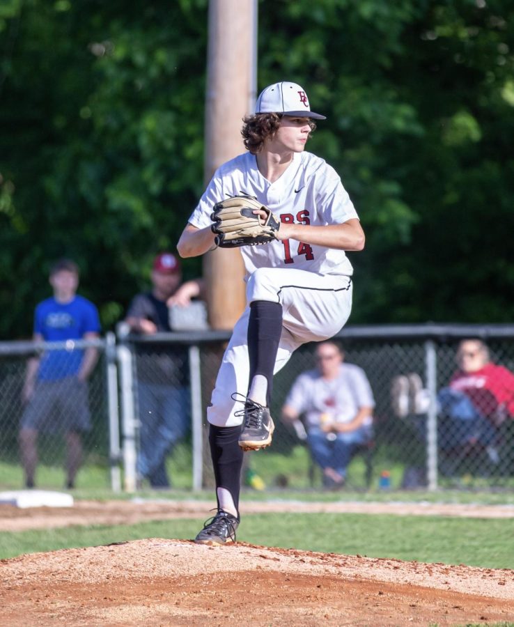 Harlan County sophomore Tristan Cooper delivered a pitch at Clay County in 13th Region Tournament action Tuesday.