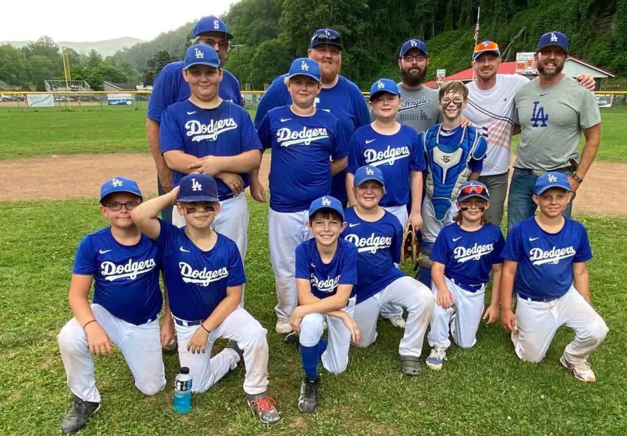 The Benham Lodge Dodgers completed the regular season of the Tri-City Little League with a 16-0 record. Team members included, from left, bottom row: Nathan Harrell, Barrett Baldwin, Carson McBee, Kyllian Jackson, Landon Curry and Tobey Lunsford; middle row: Byron Shepherd, Carson Clark, Liam Blanton, Elijah Creech and Stephen Creech; back row: assistant coach Tony Clark, assistant coach David Williams, coach Stephen Creech, assistant coach Michael Clark and assistant coach Drew Baldwin.