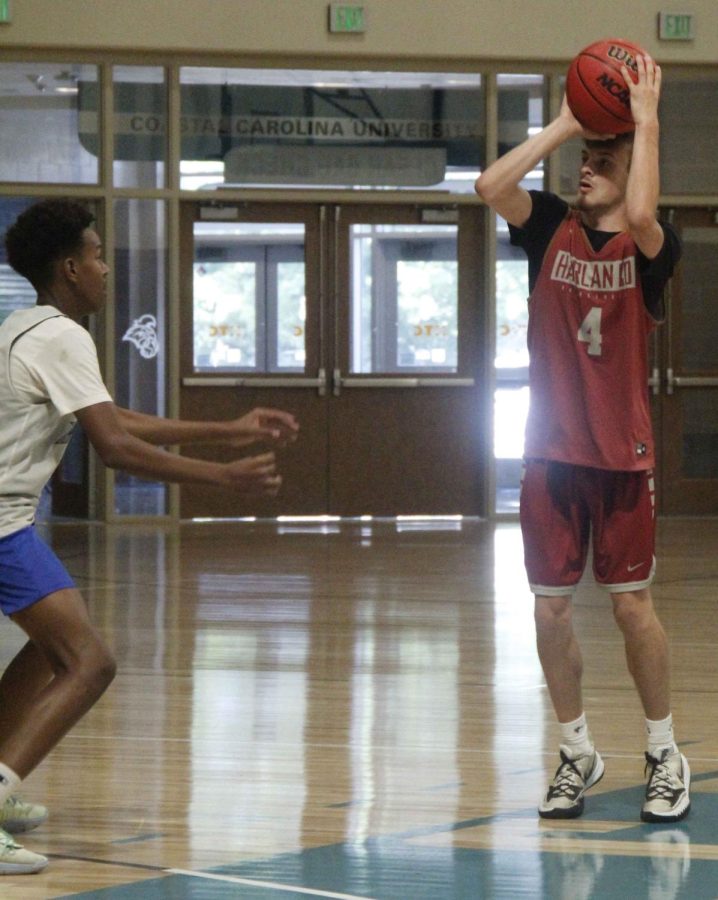 Harlan Countys Daniel Carmical hit five 3-pointers on Friday in the Bears loss to Edward Little. HCHS finished 4-3 in the three-day camp.