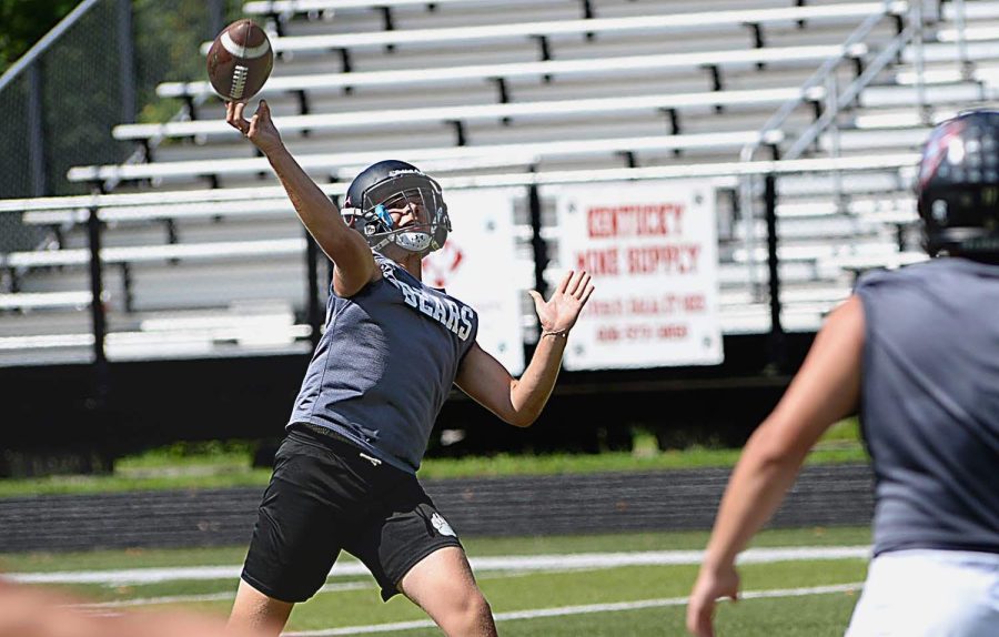 HCHS quarterback Ethan Rhymer let go of a long pass Wednesday in scrimmage action against Middlesboro. Rhymer passed for 422 yards last season.