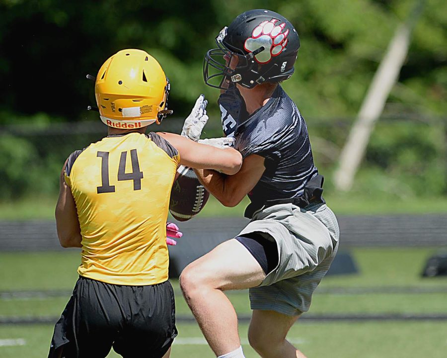 Harlan County junior receiver Jonah Swanner battled for a catch in a 7-on-7 scrimmage Wednesday against visiting Middlesboro. Swanner led the Bears last season with 17 receptions for 413 yards.