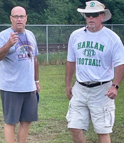 Harlan coach Eric Perry (left) and his brother, Jerry, are back together on the Green Dragons coaching staff. The two worked together in the 1990s when Jerry Perry was the head coach at Garrard County.