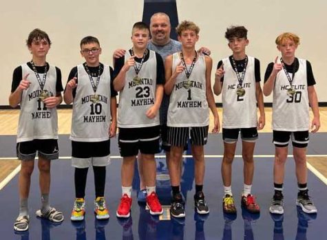 A group of Harlan County seventh-graders won the Morristown Summer Finale over the weekend at Lakeway Christian Academy. Harlan County won all four of its games to capture the tournament championship. Team members include, from left: Brady Smith, Dylan Collins, Eli Noe, coach Timbo Noe, Ryan Day, Kaden Jones and Brenton Bargo.