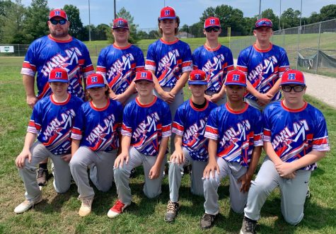 The Harlan Junior League (ages 13-14) team includes, from left, front row: Aidan Lewis, Colby Shepherd, Jesse Gilbert, Jaxson Perry, DaShaun Smith and Sebastian Mosley; back row: coach Brad Shelton, Grant Shelton, Luke Luttrell, Brayden Morris and Chance Sturgill.