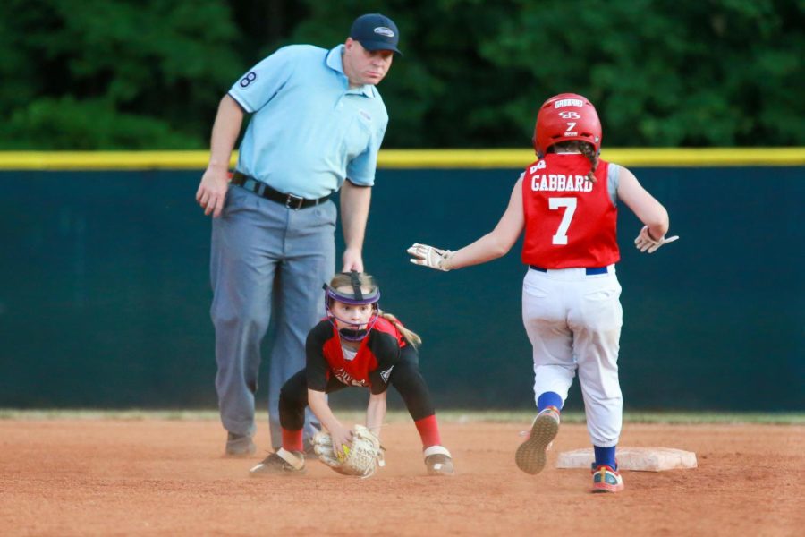 Harlan All-Stars shortstop Aniston Burton fielded a throw on a steal attempt in action from the District 4 Tournament. Jackson County eliminated Harlan with a 1-0 victory.