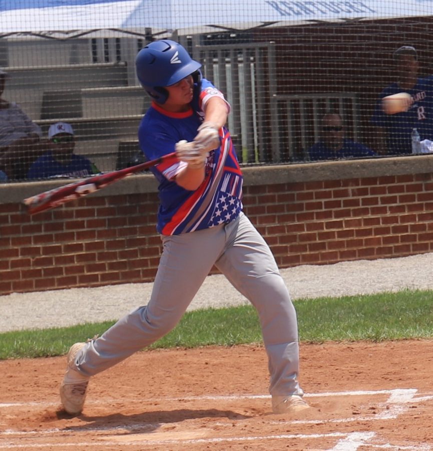 Harlan All-Stars third baseman Chance Sturgill went after a pitch in Saturdays Junior League State Tournament. Sturgill had a hit and drew a walk in the opening game.