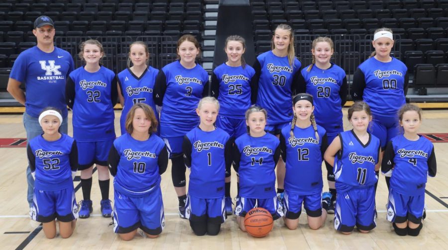 Team members include, from left, front row: Kirstyn Buell, Baylee Shope, Madison Woods, Bailey Burkhart, Gracie Youngs, Anna Gross and Carly LeFevers; back row: coach Robbie Middleton, Anessa Carroll, ,Shaleigh Ward, Mylee Botts, Kelsie Middleton, Vanessa Griffith, Dani Bennett and Hayleigh King.
