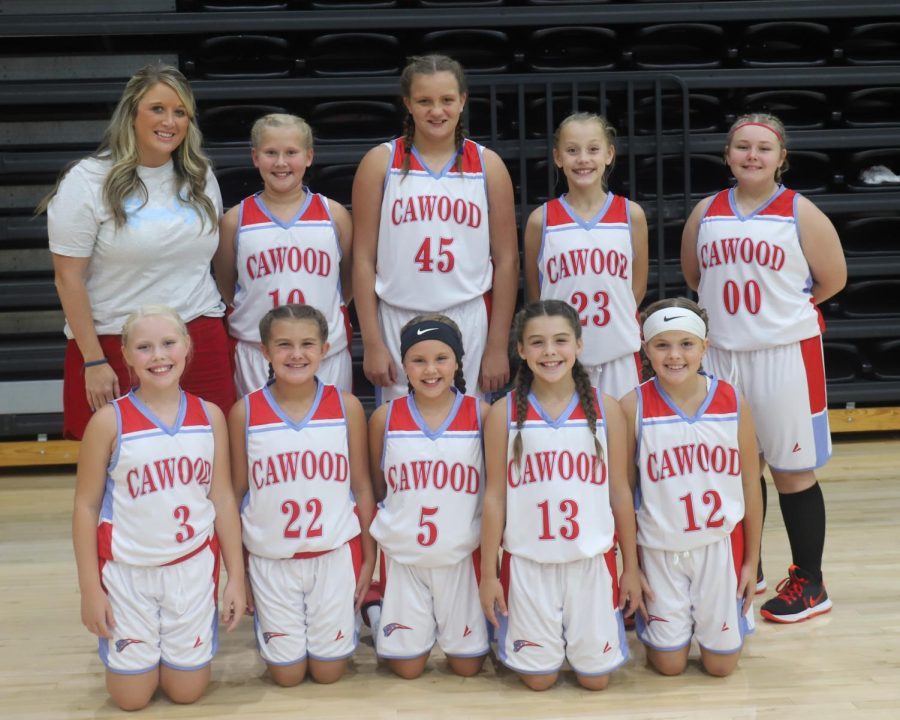 Team members include, from left, front row: Emily Moore, Bella Ford, Natalie Charles, Campbell Thompson, and Caylee Ann Yount; back row: coach Emily Ford, Allison Noe, Jocelyn Miracle, Addy Cochran and Lilly Moore.