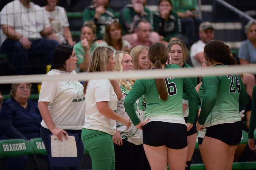 Harlan coach Shawna Cox talked to the Lady Dragons during action earlier this season. Harlan won in three sets on Monday in Lynn Camp and will be back in action tonight at home against Knox Central.