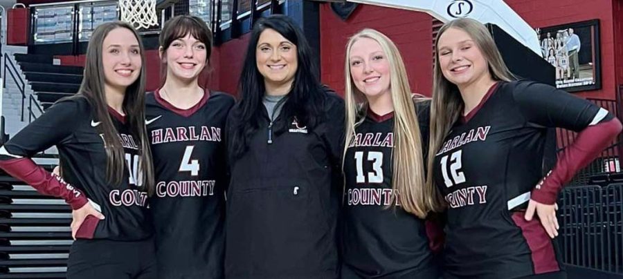 Harlan County HIgh School seniors Emilee Eldridge, Lindsay Hall, Brooklyn Wood and Chloe Shelton are pictured with coach Christina Spurlock on Senior Night. The Lady Bears defeated Lynn Camp in three sets.