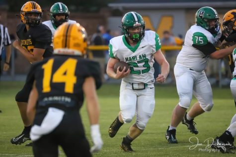Harlan senior running back Jayden Ward ran for 86 yards and scored two touchdowns on Friday as the Green Dragons fell 21-20 at Middlesboro.