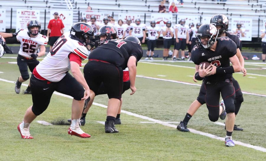 Harlan Countys Brayden Fultz scored on a 14-yard run late in the first half of the Bears junior varsity game against Whitley County. Whitley scored a touchdown in the first half on an interception and held on to edge the Bears 8-6.