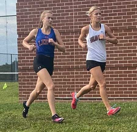 Harlan Countys Peyton Lunsford broke her own school record Saturday in the season-opening meet at North Laurel High School.