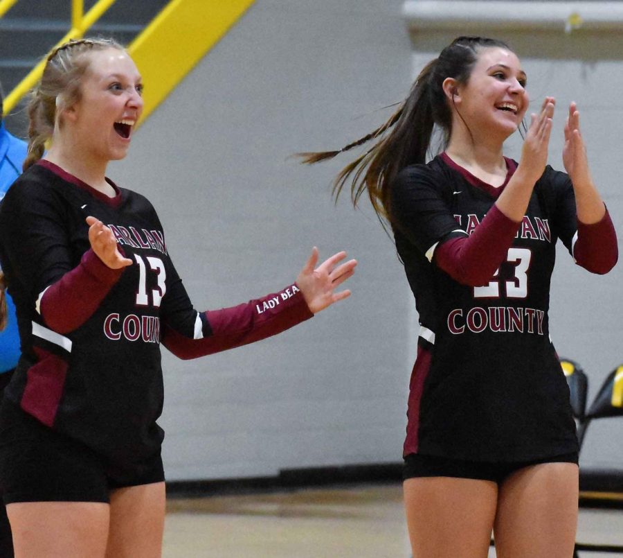 Harlan Countys Brooklyn Wood and Ashton Evans celebrated during the Lady Bears district tournament win Monday over Harlan.