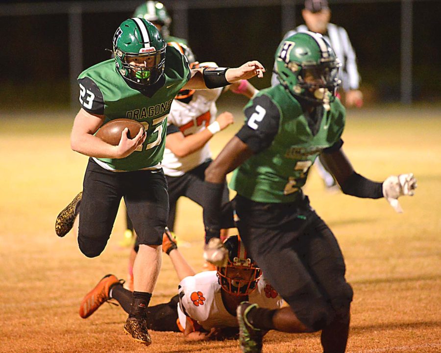 Jayden Ward ran for two touchdowns Friday in Harlans 21-18 loss at Leslie County.