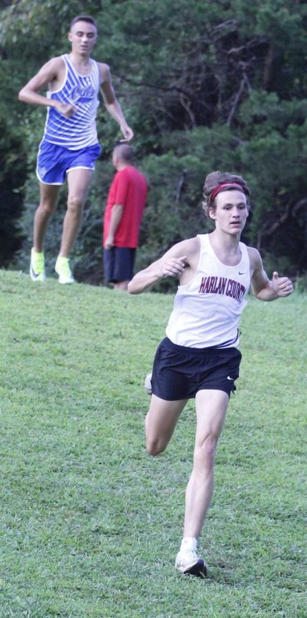 Harlan County senior Andrew Yeary, pictured in action earlier this season, was the winner in a race at Whitley County High School.