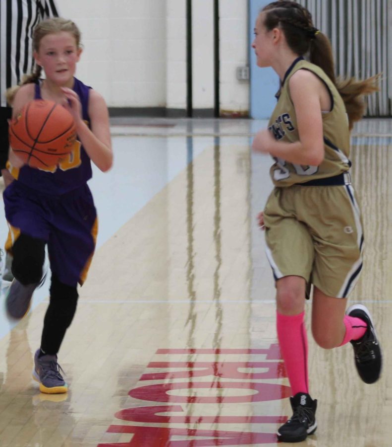 Wallins Brylie Wilson raced down the court in tournament action Saturday against Evarts.