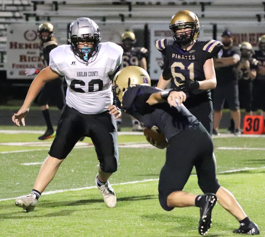 Harlan+County+lineman+Cooper+Blevins%2C+pictured+in+action+earlier+this+season%2C+helped+the+HC+defense+dominate+Thursday+in+a+32-12+win+at+Bell+County+in+eighth-grade+football+action.