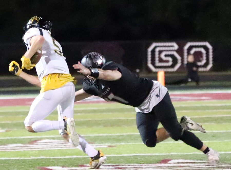 Harlan+County+senior+linebacker+Josh+Sergent+went+for+a+tackle+in+a+game+earlier+this+against+Clay+County.+Sergent+and+the+Black+Bears+close+their+district+schedule+Friday+at+Perry+Central.