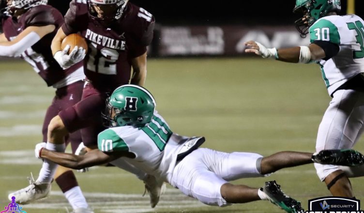 Harlan defensive back Darius Akal moved in for a tackle of Pikeville running back Blake Birchfield in Friday’s playoff game. Birchfield scored one of six Pikeville touchdown in the Panthers’ 43-7 victory.