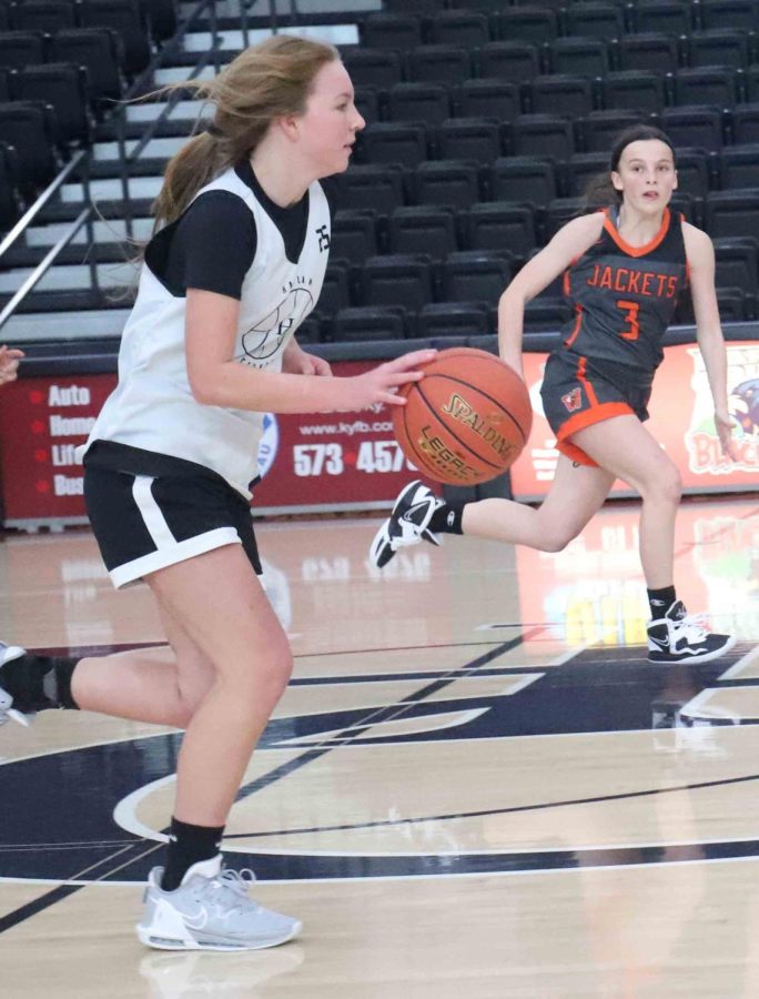 Harlan County freshmen guard Cheyenne Rhymer scored 10 points in both junior varsity and varsity scrimmages Saturday as the Lady Bears swept WIlliamsburg.