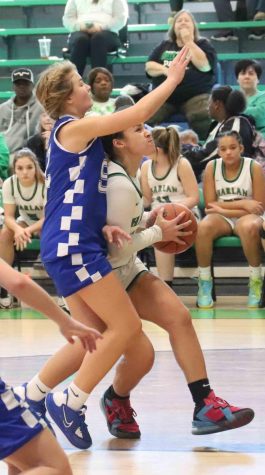 Harlans Kylie Noe worked inside for two of her 19 points during the Lady Dragons 55-39 victory over visiting Shelby Valley in scrimmage action.