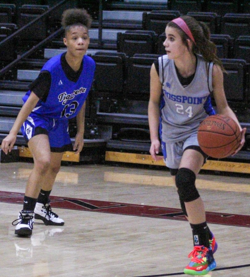 Rosspoints Jaylee Cochran was guarded by Black Mountains Brianna Vick in action from the seventh- and eighth-grade county finals Thursday.