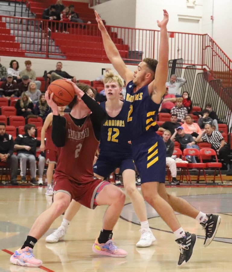 Harlan County guard Trent Noah looked for an opening against two Danville Christian defenders in scriimmage action Saturday. Noah scored 24 points in the Bears 76-67 victory.