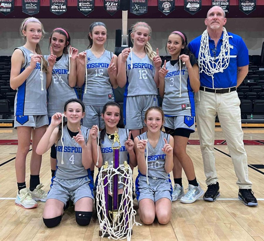 Rosspoint captured the seventh- and eighth-grade county tournament title with a 50-30 win over Black Mountain on Thursday at Harlan County High School. Team members include, from left, front row: Reagan Clem, Emmalyn Branson and Jaycee Simpson; back row: Lauren Lewis, Jaylee Cochran, Madilynn Nolan, Shasta Brackett, Adrianna Thomas and coach Rob McHargue.