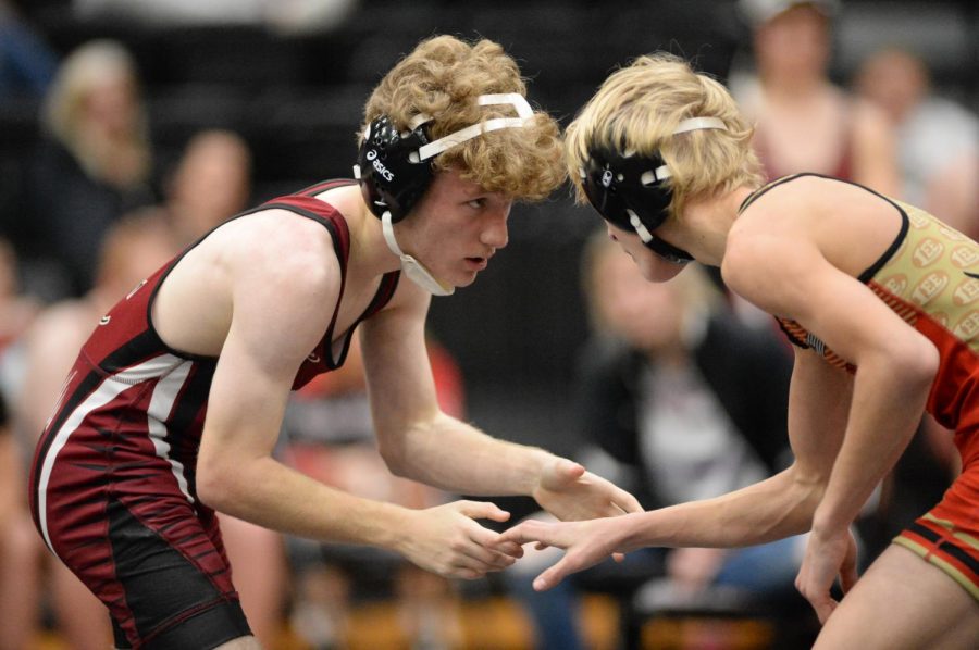 Harlan Countys Jason Maggard competed Wednesday in a match against a Lee, Va., wrestler. The Bears defeated Lee and Knott Central and lost to Bell County.