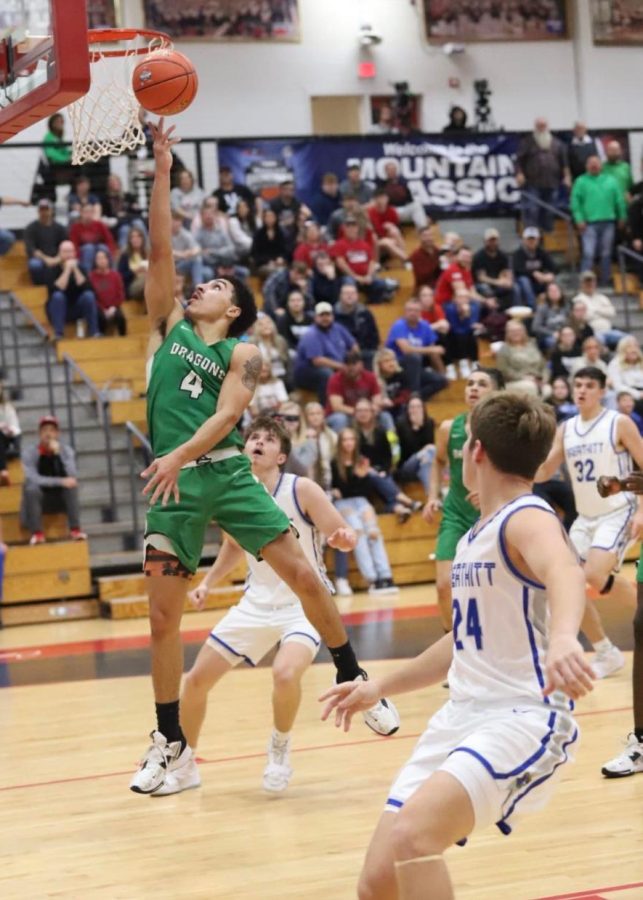 Harlan senior guard Kaleb McLendon went up for two of his 11 points in the Green Dragons 75-56 win Friday over Breathitt County in the semifinals of the WYMT Mountain Classic.