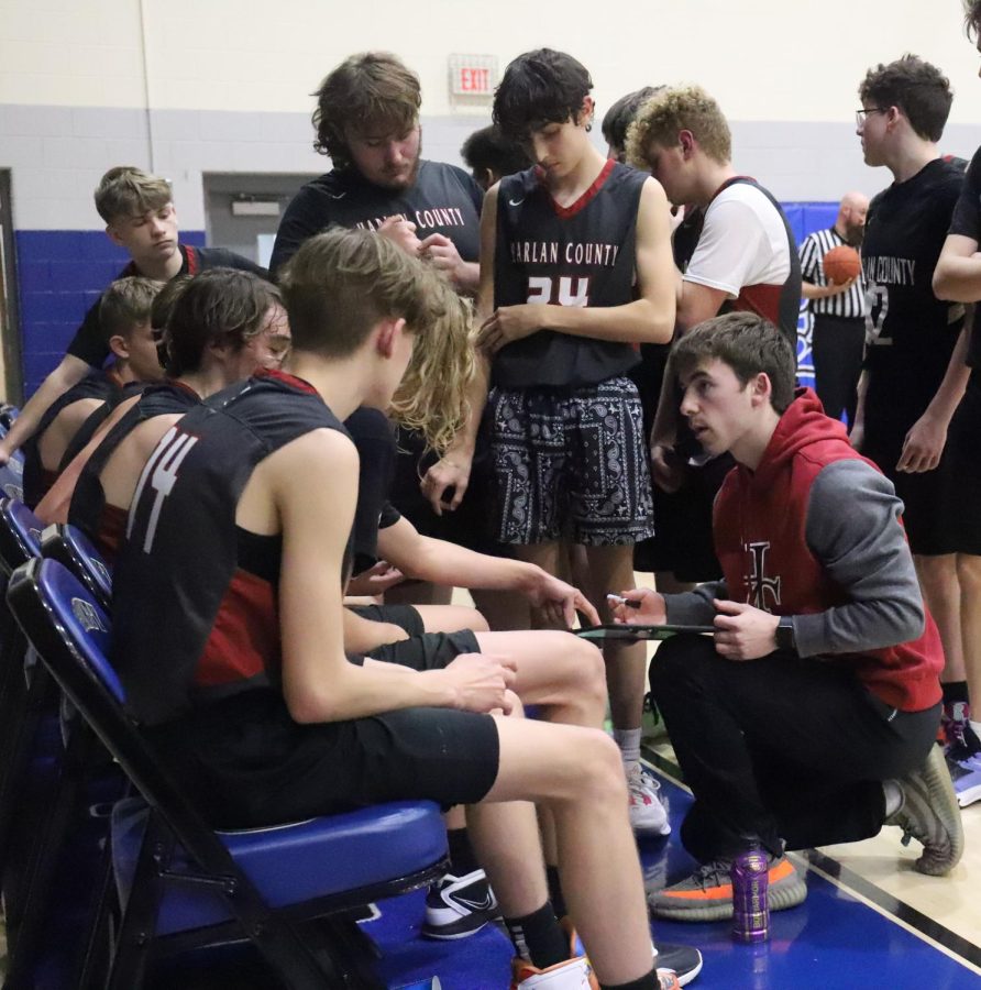 Cameron Carmical talked with his team during a timeout in a freshman game Monday at Bell County, his first as coach. 