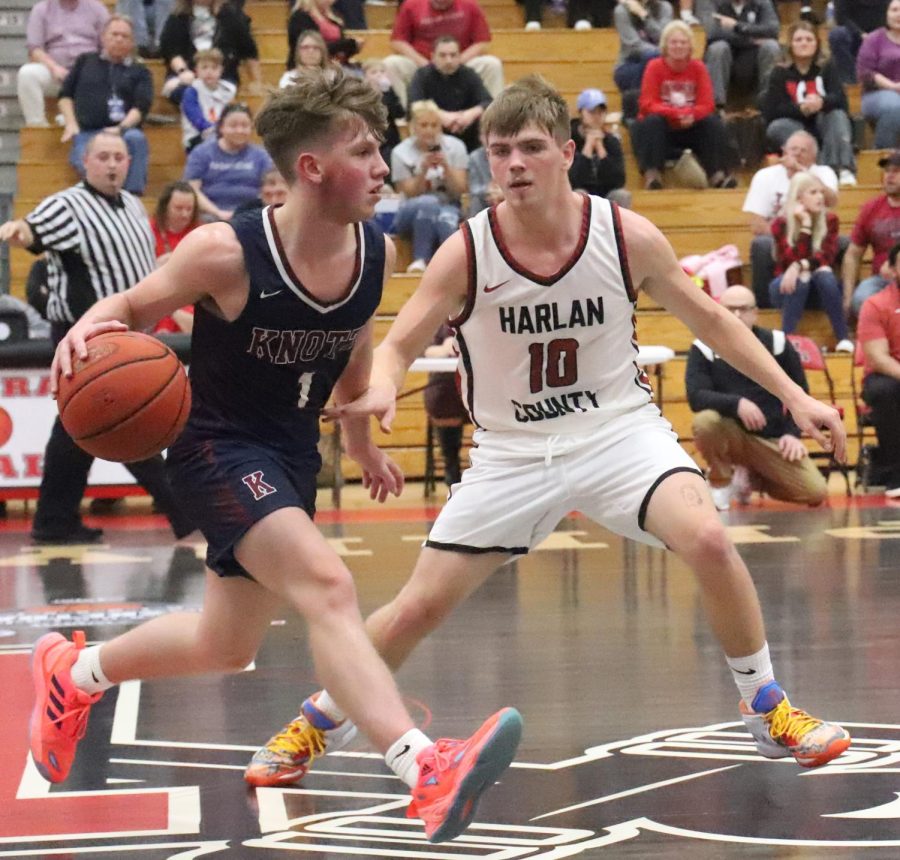 Harlan County junior Jonah Swanner guarded Knott Centrals Drake Slone in the WYMT Mountain Classic on Wednesday. Harlan County advanced with a 63-40 victory.