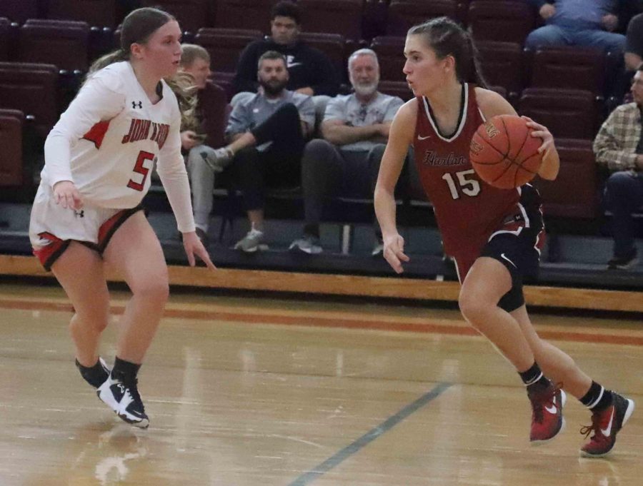 Harlan+County+guard+Ella+Karst+worked+against+John+Hardins+Paris+Parker+in+Fridays+game+at+the+Chain+Rock+Classic+at+Pineville.+Karst+scored+22+points+to+lead+the+Lady+Bears+in+a+49-46+loss.