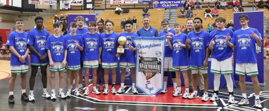 The Harlan Green Dragons won the first WYMT Mountain Classic title in school history with a 66-56 win Saturday over Perry Central in the tourney finals at the John C. Combs Arena.