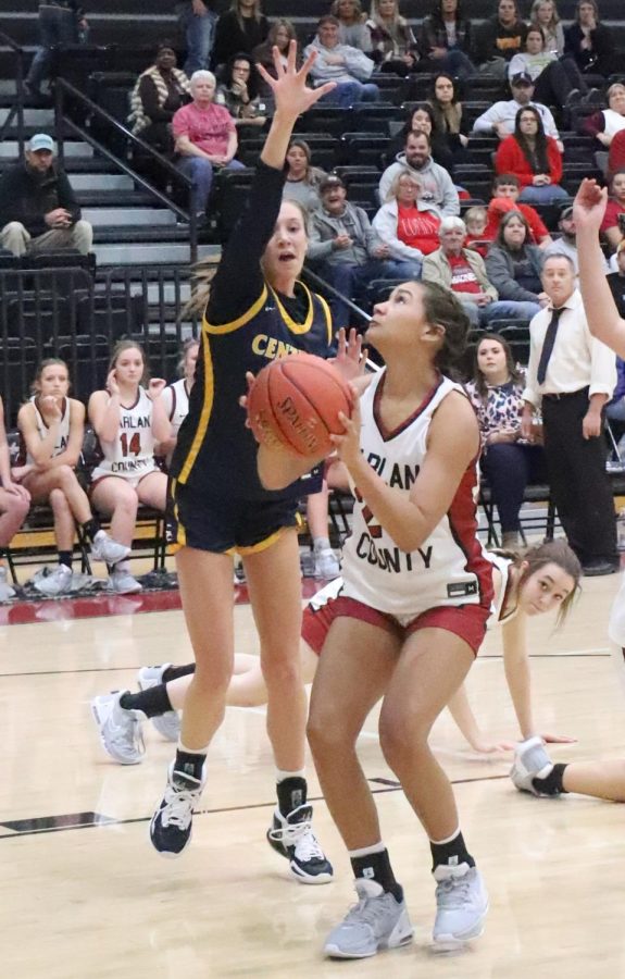 Harlan Countys Paige Phillips worked against Knox Centrals Reagan Jones on Thursday. The Lady Panthers opened their season with an 81-60 victory.
