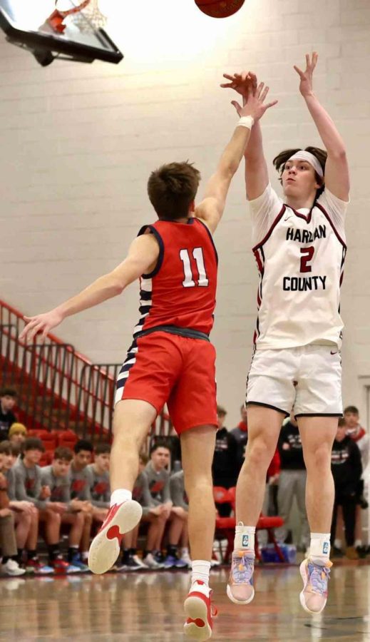 Harlan Countys Trent Noah put up a shot against St. Henry on Saturday. Noah had 20 points and 10 rebounds in the Bears 75-65 victory. 