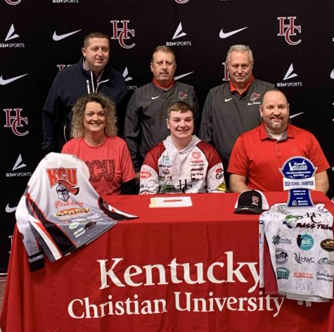 Harlan County High School senior Dalton Blakley signed with Kentucky Christian University on Tuesday to continue his athletic/academic career. Blakley is pictured with his parents, Angie and Kevin Blakley, as well as HCHS athletic director Eugene Farmer and Kentucky Christian coaches Gene Nornhold and Ricky Kempton.