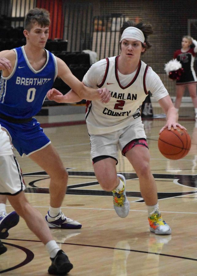 Harlan County guard Trent Noah worked against Breathitt Countys Christian Collins in Tuesdays game. Noah scored 33 points as the Bears won 87-78 in overtime.