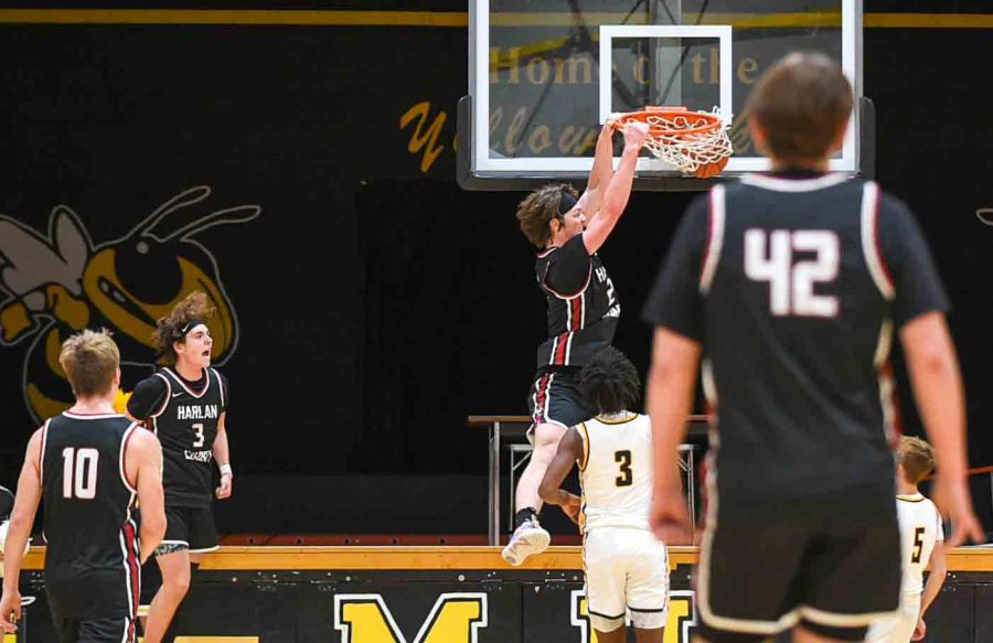 Harlan County guard Trent Noah slammed home two points off a pass from Maddox Huff during Fridays district clash at Middlesboro. The Black Bears improved to 14-3 with a 79-46 win.