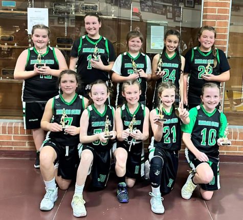 Harlan Elite won a fourth-grade AAU tournament over the weekend in Johnson City, Tenn. Team members include, from left, front row: Khloe Daniels, Baylee Clark, Blakely Snelling, Lilly Daniels and Lillie Carver; back row: Kialia Phillips, Crissalynn Jones, Everly Freyer, Jerrah Phillips and Bella Lemar.